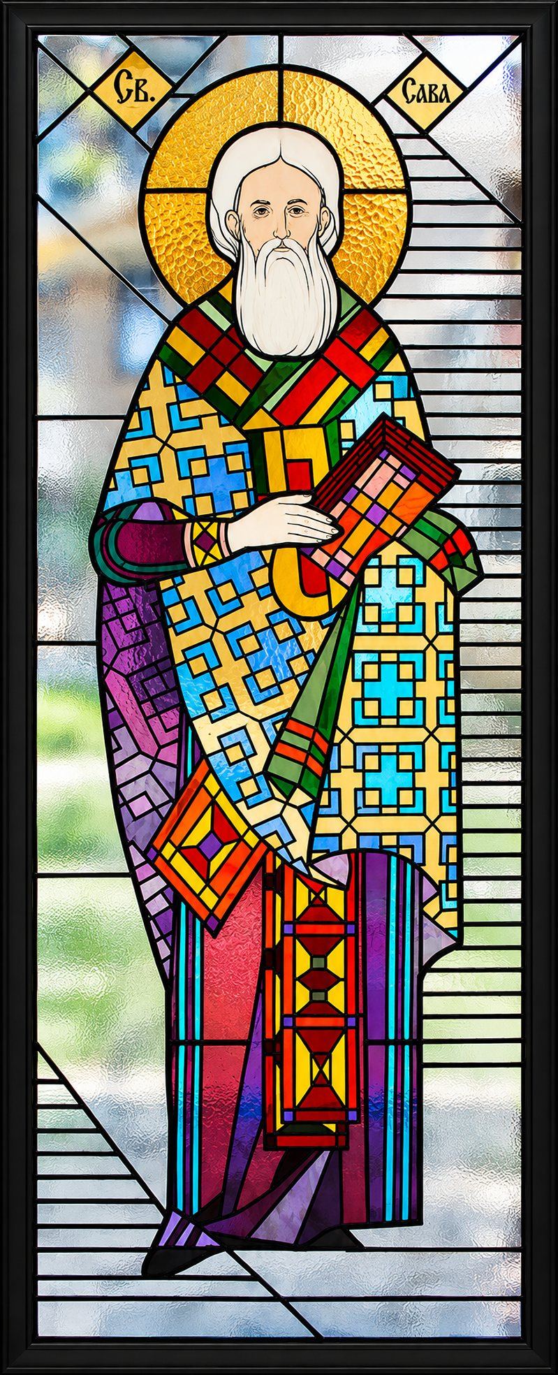 Stained glass window of Saint Sava as archbishop with the Gospel, Church of Saint Sava, Golija, Montenegro