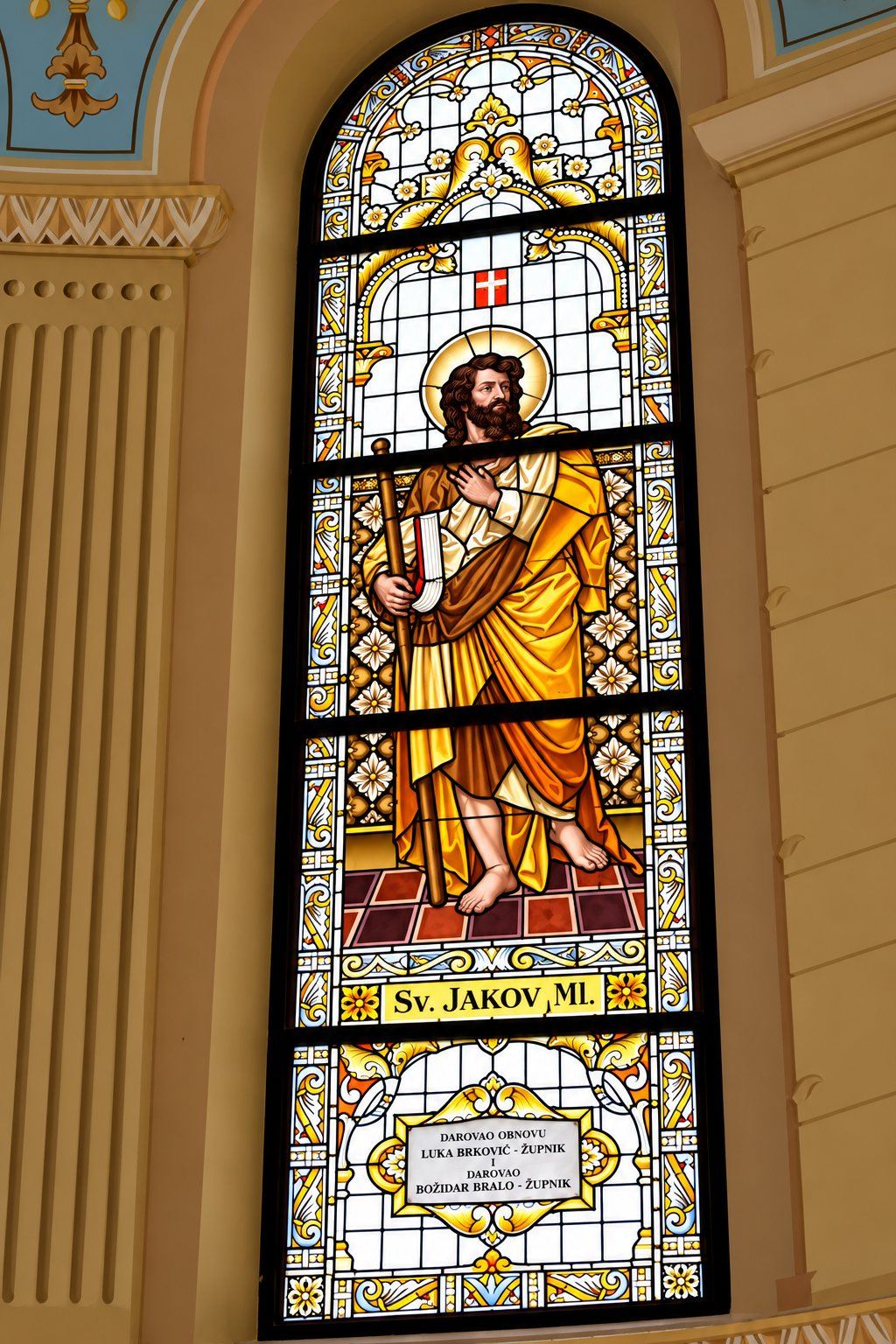 Restored stained glass window of Saint James the Less with his staff, Saint Joseph, Sarajevo