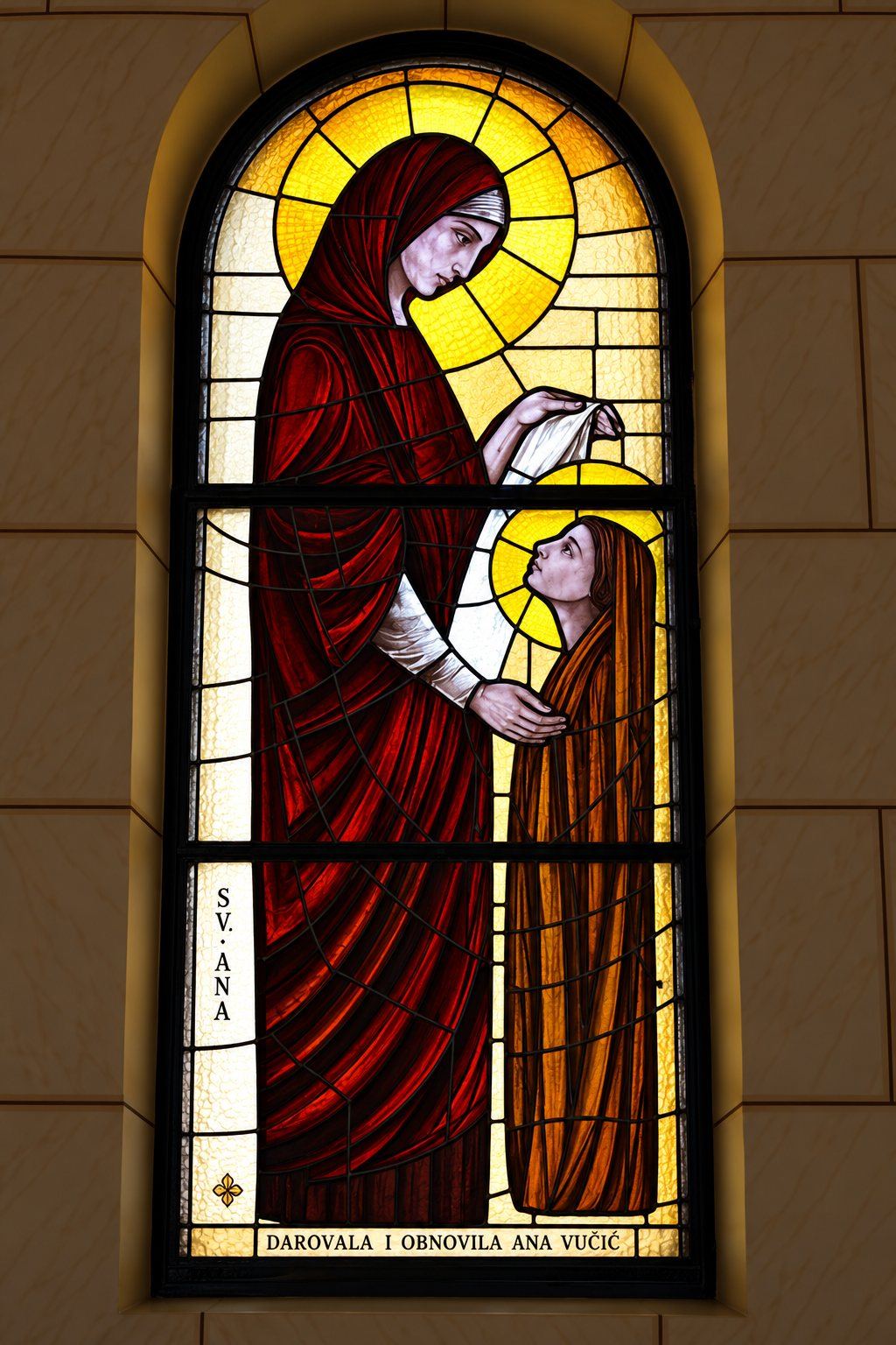 Stained glass window of Saint Anne with the young Mary, Saint Joseph, Sarajevo