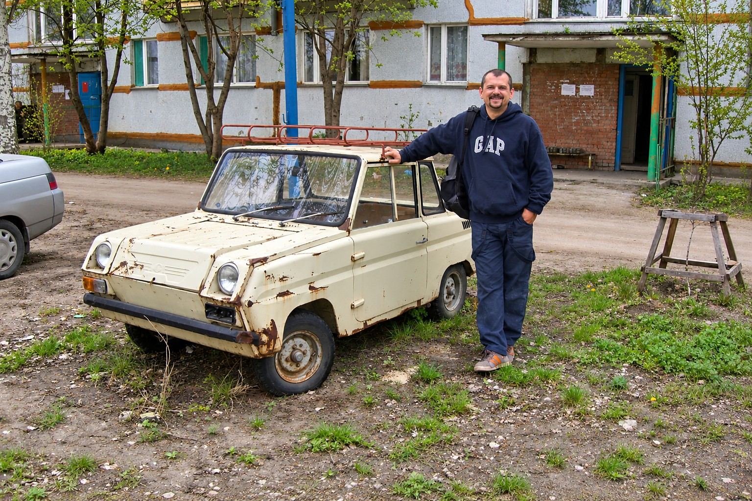 Stevan Stanisic beside an SMZ S-3D, the 2 seat Soviet microcar made for disabled drivers, in Russia, 2007