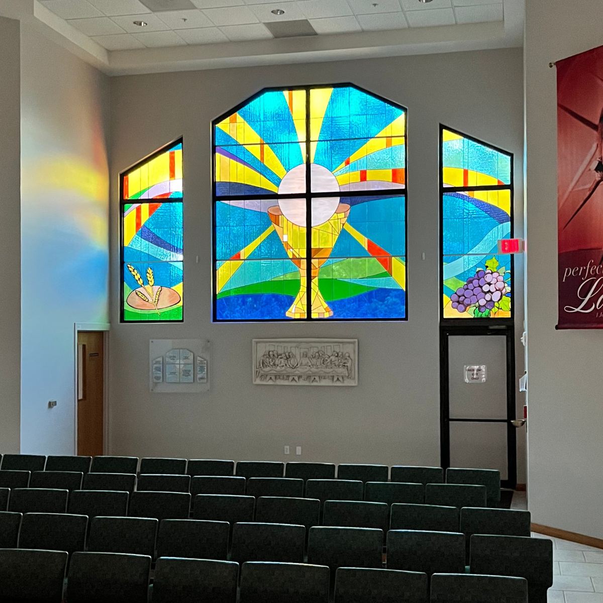 Eucharist symbols in the stained glass at St. Therese Catholic Church