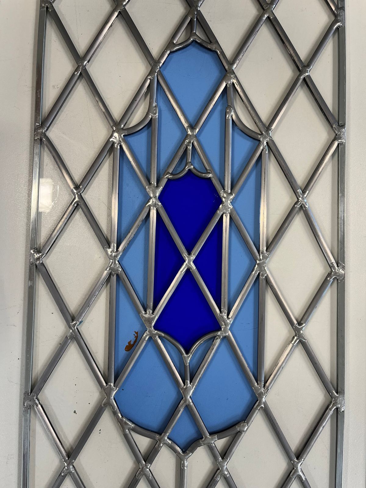 Geometric stained glass windows at the Kellner residence in Naples, Florida