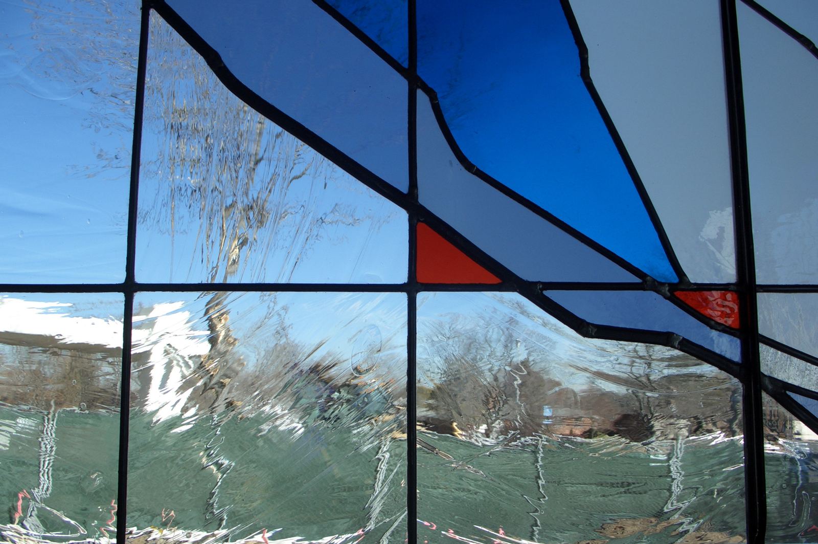 Stained glass at the Adoration Chapel of Risen Christ Church in Denver, photo 2