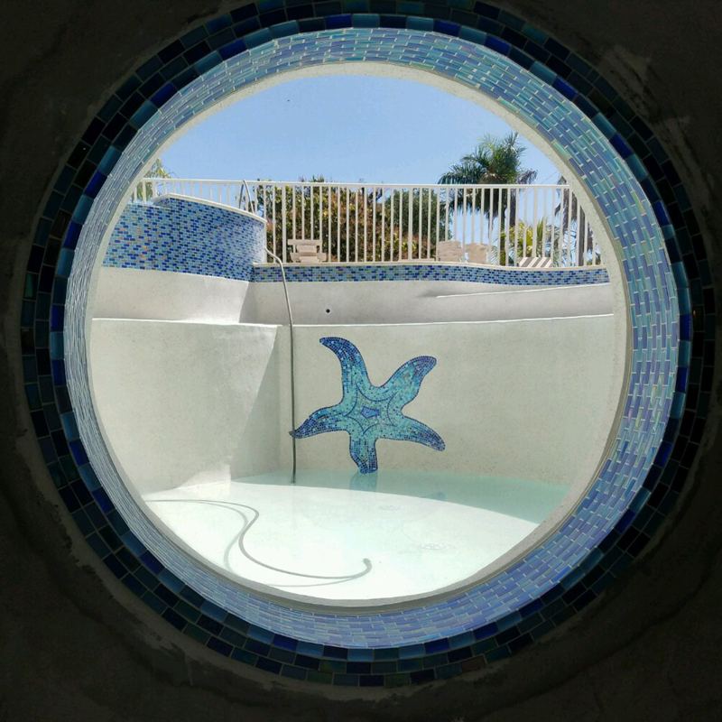 Glass mosaic in a residential swimming pool in Naples, Florida