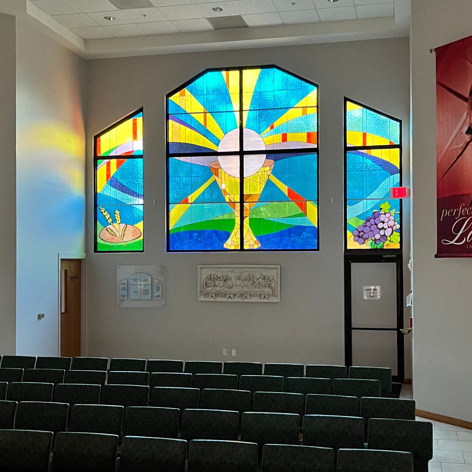 Eucharist symbols in the stained glass at St. Therese Catholic Church
